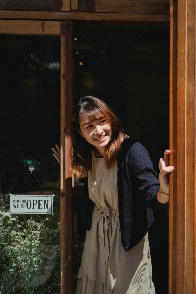 Smiling shop owner